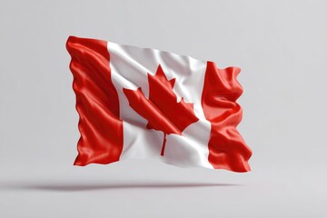 A Canadian flag billows gently against a muted background