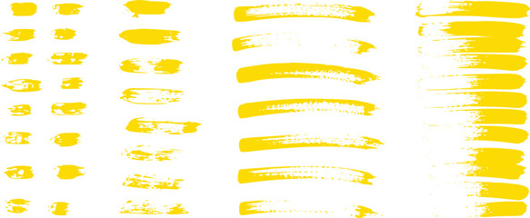 Collection of Yellow Brush Strokes and Paint Splatters on White Background