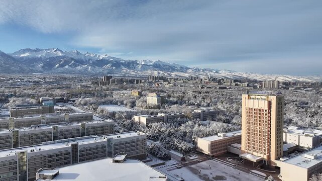 A drone view of the upper part of the Kazakh city of Almaty after a snowfall.