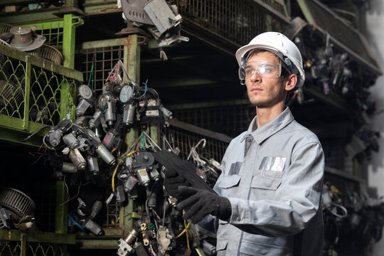 Professional adult Engineer male work in factory working checking stock inventory data with tablet computer. - Powered by Adobe