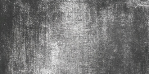 Grunge textured background in black and white with scratched and distressed cement wall effect.