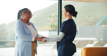 Nurse, senior woman and holding hands for trust, wellness and thank you for kindness in home....