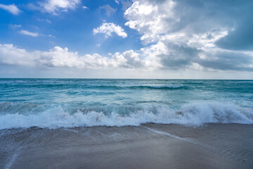 Sea waves background. Summer ocean water motion. Ocean splash wave background. Deep blue sea beach. Turquoise wave. Dreamy exotic sea beach. Beautiful sea beach waves.