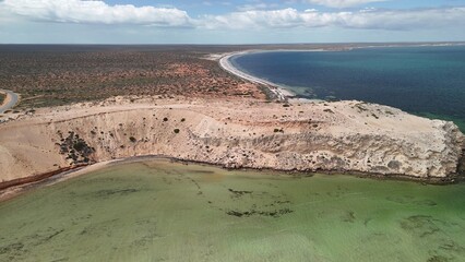 Aerial drone view of Eagle Bluff near Monkey Mia Western Australia with rugged cliffs and turquoise waters