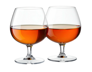 Two brandy snifters with amber liquid