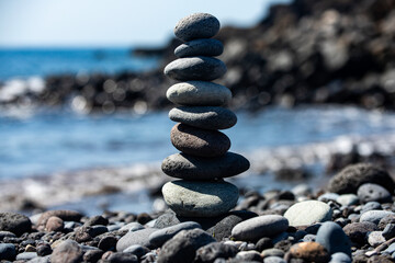 Meditation rocks symbolize peace. Meditation rocks bring mindful calm. Meditation rocks stand in...