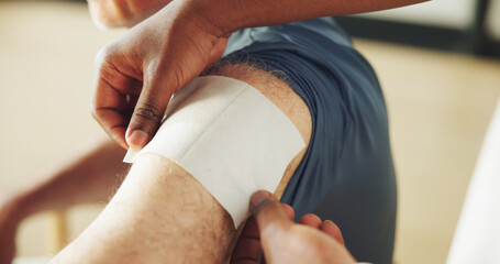 Hands, physiotherapy and patch on shoulder for injury, recovery and rehabilitation at clinic. Person, chiropractor and service for patient with pain, muscle ache or tape for wellness or inflammation