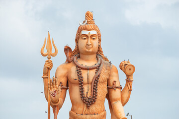 India, Gujarat, Saurashtra, Huge Statue of Lord Shiva Situated Near Nageshwar Temple, one of the 12th Jyotirlinga of Lord Shiva.