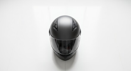 Black Motorcycle Helmet on White Background, Top View.