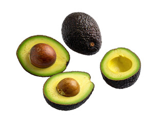 Ripe avocados, whole and halved, against a black background