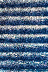 Roofing material in the form of slate made of textolite and fiberglass, close-up of the texture of the material