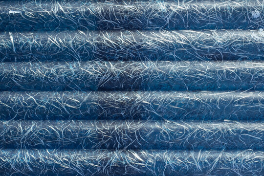 Roofing material in the form of slate made of textolite and fiberglass, close-up of the texture of the material