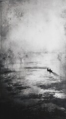 A Serene Voyage: An artistic grayscale image capturing a small boat traversing a vast body of water, set against a dramatic sky.