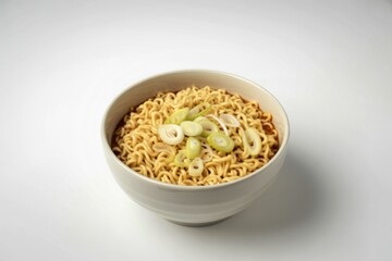 a ceramic bowl filled with cooked instant ramen noodles