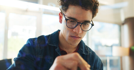 Review, planning or man with glasses in office, reading app development report or project proposal. Reflection, technical document or software programmer with prototype update, workplace or check