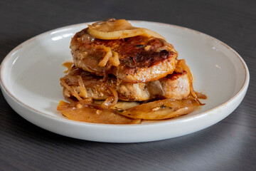 juicy pork chops with caramelized onions and apples fall meal
