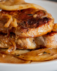 juicy pork chops with caramelized onions and apples fall meal