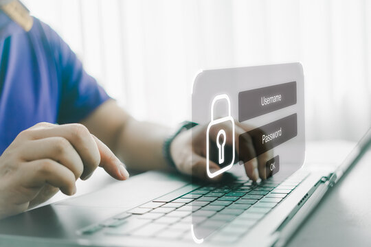 User typing login and password at home, secure access to the personal information and big data. cyber security, the digital crime concept, and data protection from hackers.