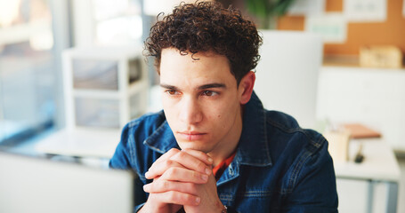 Computer, design and thinking with business man in office for creative process or productivity. PC, planning and problem solving with designer at desk in workplace for ideas, solution or vision