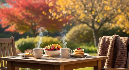 Sunny autumn breakfast outdoors: hot coffee, pancakes & fruits