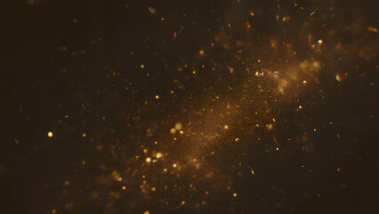 Golden glowing particles creating a magical sparkling light effect on a dark ambient background