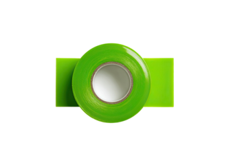 Green tape roll unraveling, isolated on black background