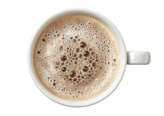 Foamy brown coffee in a white mug, viewed from directly above