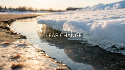 Melting ice edge in water reflecting daylight