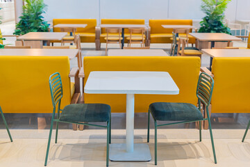 Tables and chairs in the restaurant room