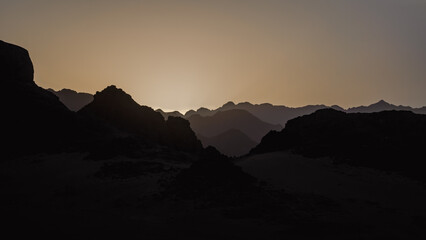 rocky mountains and desert landscape and sunset sky in Egypt