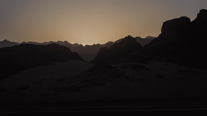 rocky mountains and desert landscape and sunset sky in Egypt