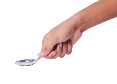 Human hand grasping a silver spoon, isolated cutout for culinary concepts.