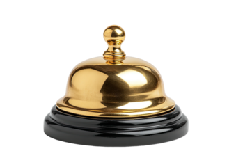 Gleaming golden bell on a glossy black base
