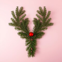Pine Branch Letter Y with Red Ornament on Soft Pink Holiday Background