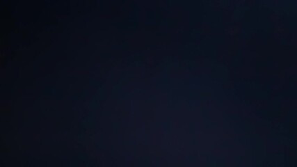 Dark Abstract Black Screen Background with Subtle Analog Noise and Grain Texture, Looping Seamlessly for Creative Video Projects and Graphic Design