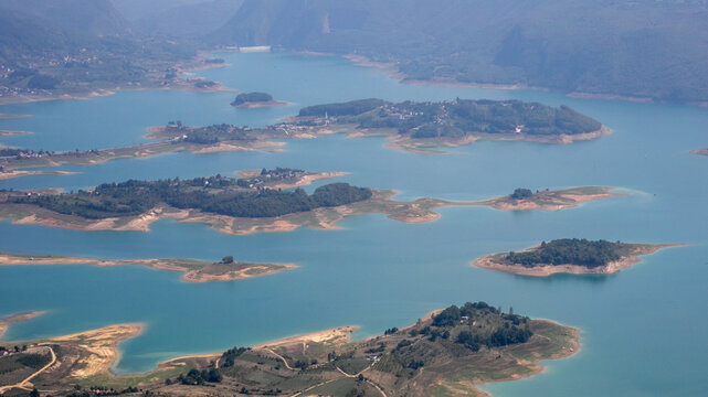 Serpentine waterways entwine with emerald islands, evoking a mystical archipelago vibe, perfect for World Wetlands Day or Earth Day - Powered by Adobe