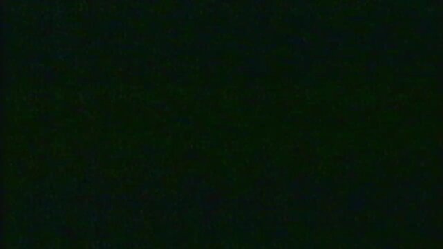 Dark Green Analog TV Static Noise with Horizontal Glitches and Screen Artifacts, Retro Old Video Playback Effect for Vintage Backgrounds