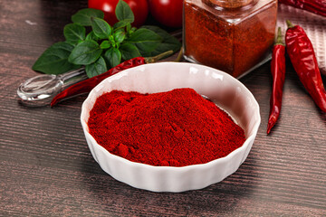 Spicy dry paprika powder in the bowl