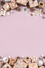 Festive Christmas background with different size gift boxes and Christmas decorations. Top view. Copy space for text.