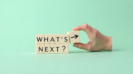 What's next?, business concept. Next step of work, plan, strategies, vision, project implementation, new opportunities and execution. Putting wooden cubes with What's next?