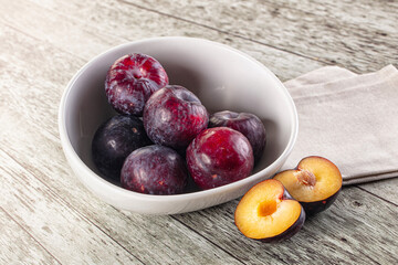 Ripe sweet juicy plum heap