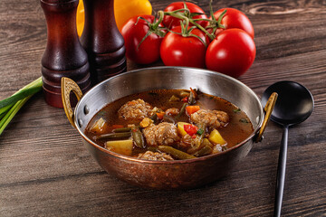 Tomato Soup with meatballs and vegetables