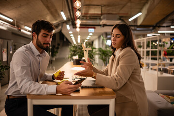 Business colleagues collaborating on an office project