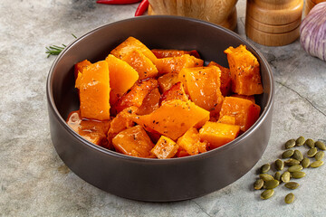 Vegan cuisine - baked pumpkin with herbs