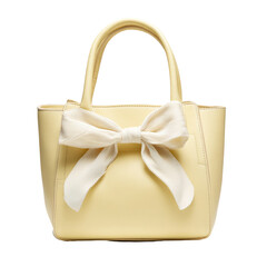 Pale yellow handbag with fabric bow detail against black background