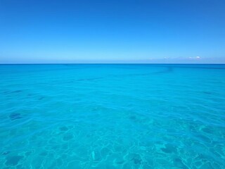 Vast, tranquil azure ocean expanse meeting a clear horizon, ocean,  tranquil