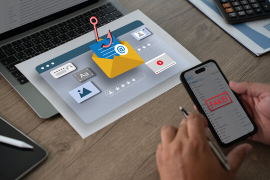 phishing email Email attachment warning man using his laptop to email scam and phishing