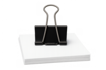 Black binder clip holding a stack of white paper, organizing documents for business and office work