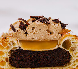 Delicious dessert with layers of chocolate and cream at a pastry shop