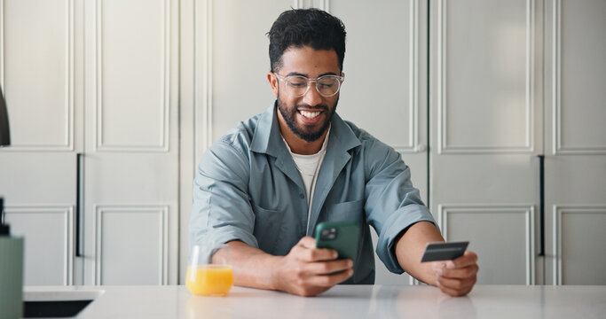 Happy, man or credit card in home with phone, payment or Black Friday discount for online shopping. Person, typing and fintech in apartment with tech, bank transaction and eft purchase for ecommerce.